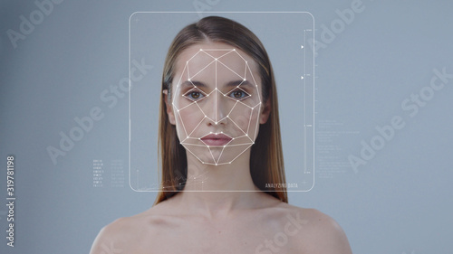 Face ID. Face Detection. 3D Facial Recognition. Technological Futuristic Biometric Scanning of Face of Beautiful Woman Isolated on Background. Concept of Personal Safety and Security.
