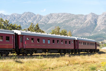 Wolseley, Swartland Region, South Africa. Dec 2019. Steam Train Excursion Passing Through The Swartland Region With A Mountain Backdrop.
