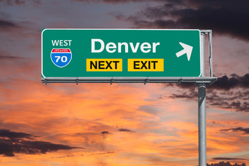 Wall Mural - Denver Colorado route 70 freeway exit sign with sunset sky.