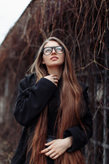 Young beautiful fashionable woman with long hair dream