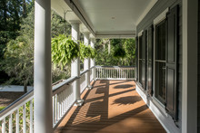 Wrap Around Porch On Beautiful Luxury Home.