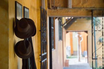 Hat and Chaps in Entrance of Hacienda La Alegria in Ecuador