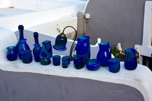 High Angle View Of Various Blue Glass Equipment On Wall
