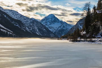 Canvas Print - Winter landscape with mountains and lake