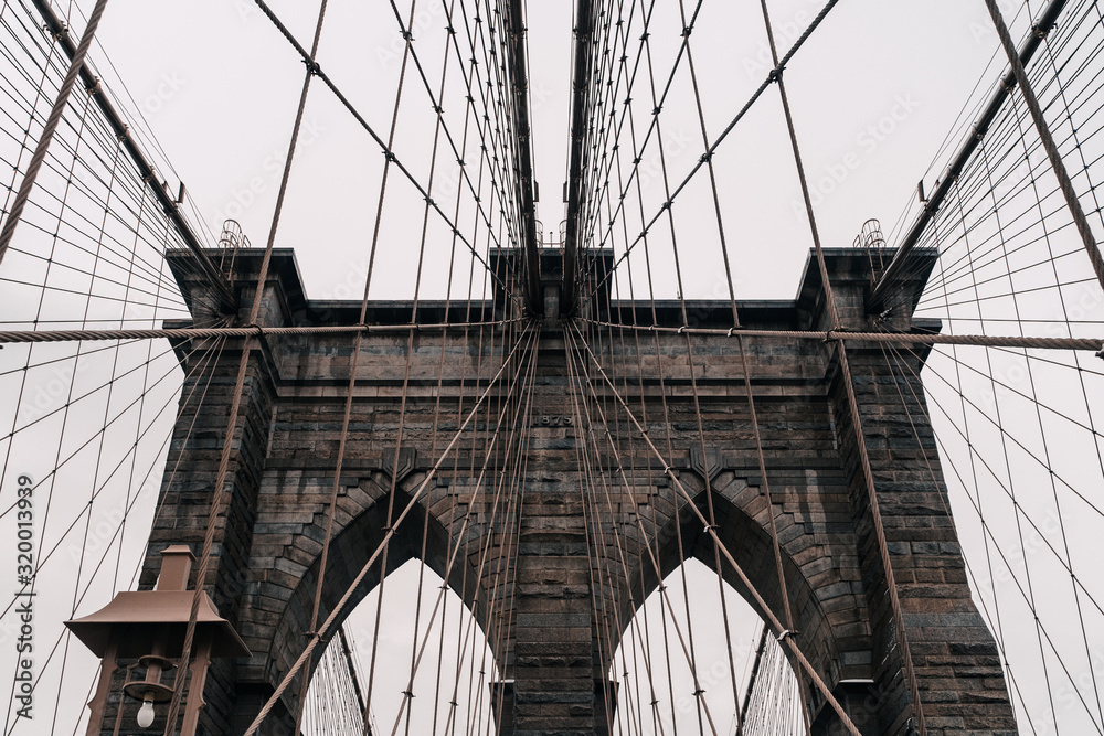 The Brooklyn Bridge from New York City in Winter I - obrazy, fototapety, plakaty 