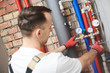 © Kadmy - plumber installing water equipment - meter, filter and pressure reducer