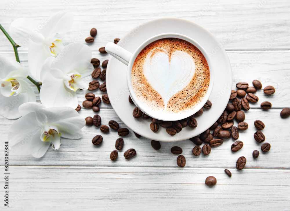 Obraz na płótnie A cup of coffee with heart pattern w salonie