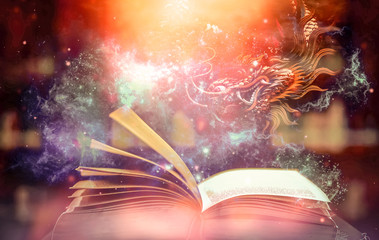 Poster - Magic book with light and shine An amazing story book with stars, and magic dragons. And sparkling lights on the background