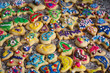 Close-Up Of Colorful Cookies With Sprinkles On Table