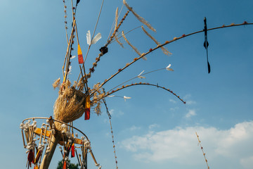 Cultural artwork in front of blue sky