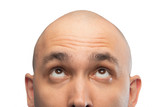 Fototapeta Las - Image of bald man looking up, half head