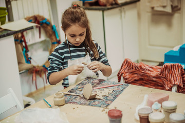 Wall Mural - children's hands sculpts clay crafts pottery school