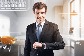 Wall Mural - Smiling businessman with smart watch, infographics