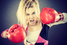 Angry Woman Wearing Boxing Gloves