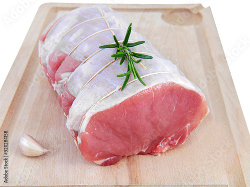 Roti De Filet De Porc Cru Sur Planche A Decouper Buy This Stock Photo And Explore Similar Images At Adobe Stock Adobe Stock