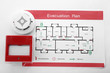 © Pixel-Shot - Evacuation plan, smoke detector and manual call point on white background