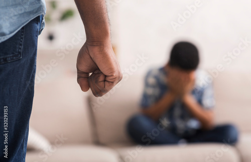 Fotografía Little black boy suffering from domestic violence of father