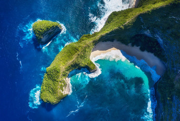 Aerial view at sea and cape. Turquoise water background from top view. Summer seascape from air. Kelingking beach, Nusa Penida, Bali, Indonesia. Travel - image