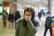© LT - masked girl to protect herself from wuhan virus in public area