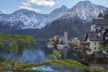 Hallstatt, A Charming Village On The Hallstattersee Lake And A Famous Tourist Attraction, With Beautiful Mountains Surrounding It, In Salzkammergut Region, Austria, In Winter Sunny Day.