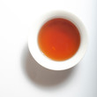 Dry Chinese oolong tea leaf and oolong tea in traditional cup on white, gaiwan tea