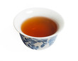 © Pavel - Dry Chinese oolong tea leaf and oolong tea in traditional cup on white, gaiwan tea