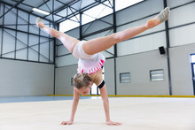 Gymnast Training At The Gym