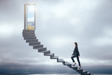 Businesswoman Walking On Ladder To Success