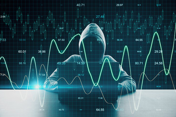 Poster - Haker at desktop using laptop with creative business chart.
