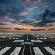 Airport Runway With Beautiful Cloudy Sky