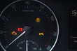© verona_studio - Tachometer dial with needle showing zero rpm with diagnostic icons isolated on black background