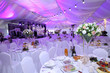 Wedding hall without guests with white chairs and decor in the outdoor wedding tent
