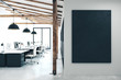 Leinwandbild Motiv Modern coworking office with empty black poster