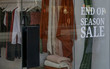 © triocean - End of the season sale sign on the window shop of fashion clothing boutigue