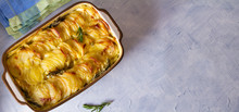 Potato Gratin (with Cream And Butter). Scalloped Potatoes Or Potato Bake. View From Above, Top View. Copy Space