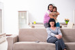 © Elnur - Young family and mother-in-law in family issues concept
