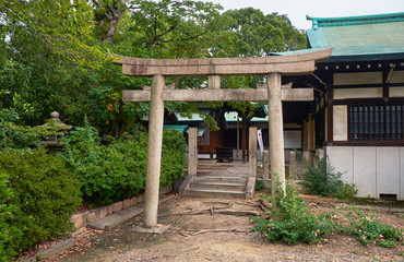 Wall Mural - The torii gate to the Shiratama Shrine. Osaka Castle. Osaka. Japan