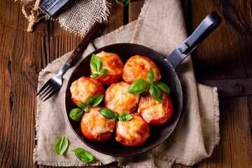 Wall Mural - Stuffed tomatoes with minced meat and cheese