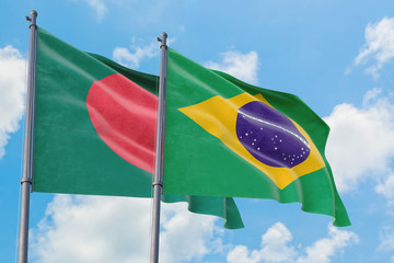Wall Mural - Brazil and Bangladesh flags waving in the wind against white cloudy blue sky together. Diplomacy concept, international relations.