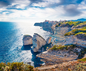 Bright afternoon scene of famous Bonifacio clifs - Le Grain de sable. Superb spring view of Corsica island, France, Europe. Brigth Mediterranean seascape. Traveling concept background..