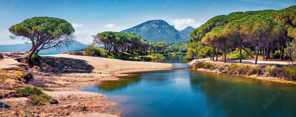 Panoramic morning view of Osala Beach. Colorful spring scene of Sardinia island, Italy, Europe. Beautiful seascape of Mediterranean sea. Traveling concept background. - obrazy, fototapety, plakaty 
