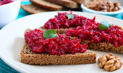 Beetroot caviar. Simple, tasty and healthy vegetable snack. Sliced rye bread with beetroot caviar. Lenten menu