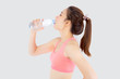 © NT_studio - Beautiful young asian woman fit shape drinking water after workout and exercise isolated on white background, girl thirsty after aerobic tired for refresh, model fitness healthy and wellness concept.