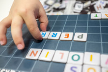 Child Practices With Word Formation Board Game