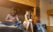 © pikselstock - Young female tourists staying in youth hostel
