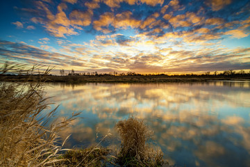 Wall Mural - beautiful sunrise over river banks
