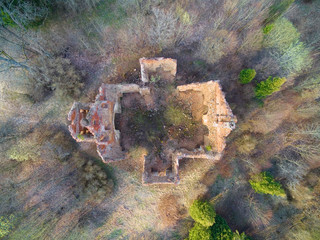 Wall Mural - Ruins of cross shaped Lutheran church in early spring scenery, Gorne, Poland (former Gurnen, East Prussia)