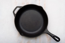 Cast Iron Skillet On Marble Countertop