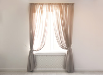 Canvas Print - Window with beautiful curtains in empty room