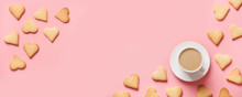 Cup Of Coffee And Cookies Shaped Of Heart On Pink. Valentine Card. Flat Lay, Copy Space.